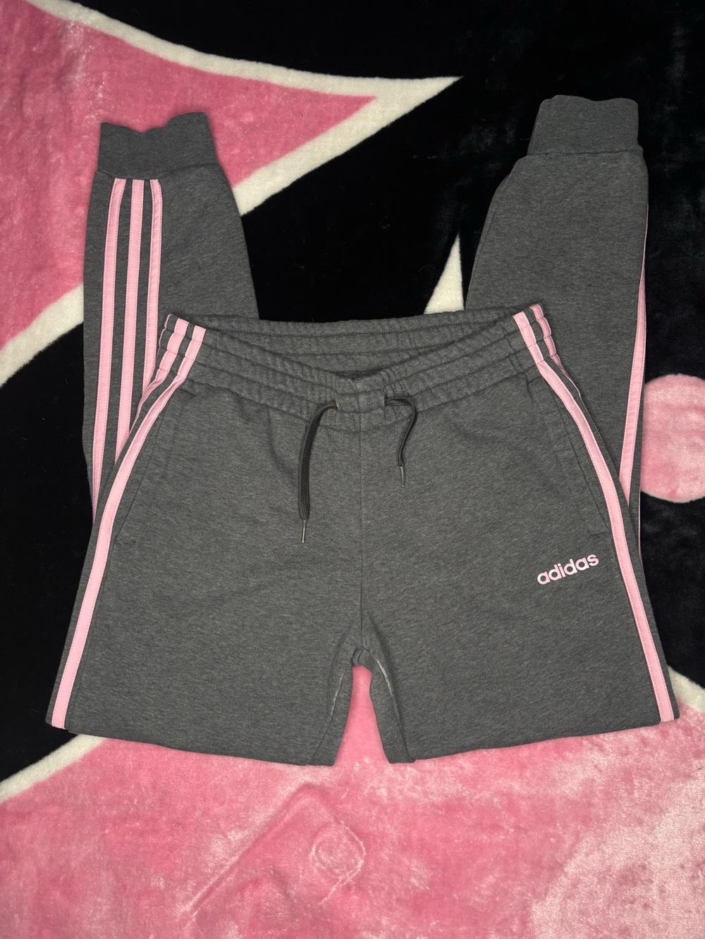 Pink Adidas striped track pants